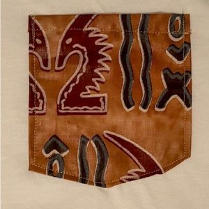 ZWF Original Afro Art pocket 
White T-shirt
New/ Unisex/ Size Large